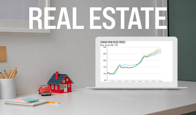 Table with house and laptop showing a chart